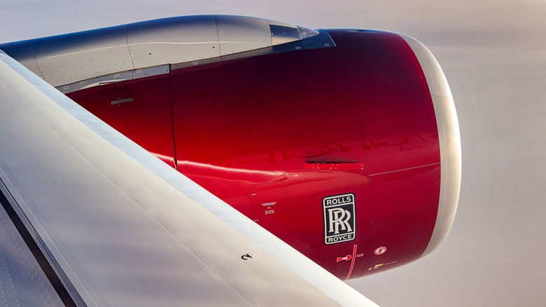 A red Rolls-Royce turbofan engine