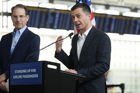 U.S. Transportation Secretary Pete Buttigieg, right, speaks as Colorado Attorney General Phil Weiser listens during a news conference to announce a new partnership that will streamline how consumer complaints against airlines are resolved in the terminal at Denver International Airport Tuesday, April 16, 2024, in Denver. (AP Photo/David Zalubowski) U.S. Transportation Secretary Pete Buttigieg, right, speaks as Colorado Attorney General Phil Weiser listens during a news conference to announce a new partnership that will streamline how consumer complaints against airlines are resolved in the terminal at Denver International Airport Tuesday, April 16, 2024, in Denver. (AP Photo/David Zalubowski)
