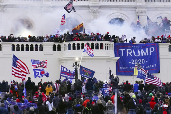 FILE - Rioters storm the West Front of the U.S. Capitol, Jan. 6, 2021, in Washington. (AP Photo/John Minchillo, File) FILE - Rioters storm the West Front of the U.S. Capitol, Jan. 6, 2021, in Washington. (AP Photo/John Minchillo, File)