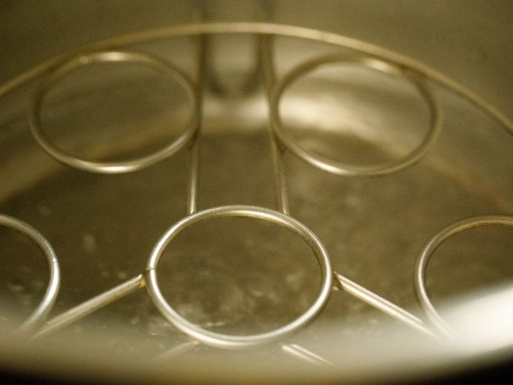 water being heated in a pot.