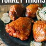 Pinterest image for smoked turkey thighs recipe.