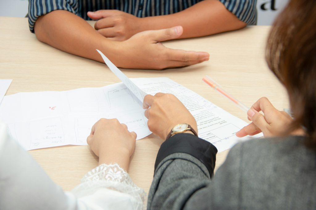 People looking at paperwork together