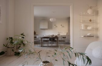 An off-white historic apartment with a tranquil and contemporary look