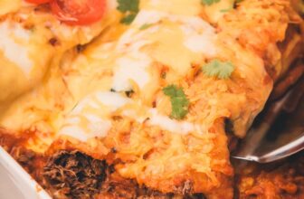 Cheesy Smothered Shredded Beef Enchiladas