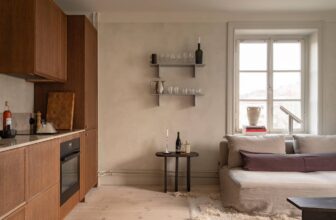 A contemporary home with modern furniture and limewash walls