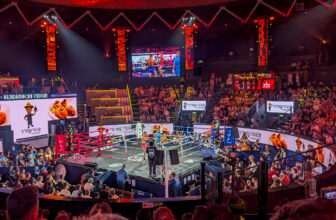 Watching a Muay Thai fight at Bangkok’s Rajadamnern Stadium with kids