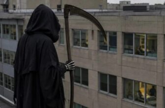 Man arrested for dressing in Grim Reaper costume on hospital roof