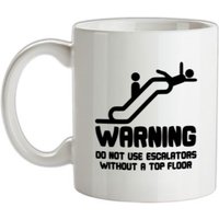 Warning Escalators mug.