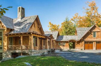 Tour this cozy mountain home in Vermont framing peaceful forest views