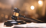 Judge rejects motion to dismiss former CFO’s complaint
