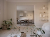 An off-white historic apartment with a tranquil and contemporary look