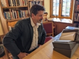 On the Trails of a Century of Mystery–Together