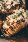 Hasselback Potatoes Stuffed with Bourbon Bacon Jam and Bubbling Blue Cheese 🥔🔥