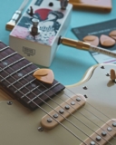 Malaysia Cooper’s Guitar-Driven Satire Cuts Through Modern-Day Chaos