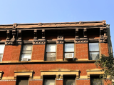 A double-flat building that was part of a whimsical trio