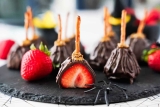 Fun & Spooky Strawberry Witch Brooms Halloween Dessert Idea