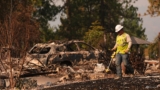 Arson suspect arrested as US northwest battles wildfires