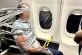 Passengers duct-tape man as American flight diverts to BWI
