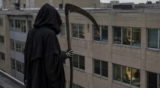 Man arrested for dressing in Grim Reaper costume on hospital roof