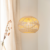 Sustainable Handwoven Spherical Rattan Pendant Light with Wave Details